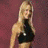 A static image shows a woman with long blonde hair in black attire against a maroon background, and a man's face below red text reading "Jeff and Stacy" on black.
