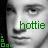 Pixelated grayscale image of a person's face with green text overlay and small square patterns on the left edge, displayed as a static buddy icon.