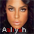 A 50x50 pixel animated contact sheet showing two side-by-side frames of a stylized portrait with the name "Aaliyah" in red and white text below, featuring subtle facial expression differences between frames.