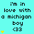 A cyan background displays repeated text 'i'm in love with a michigan boy <33' with yellow star icons varying in quantity and position across three