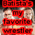 A pixelated image with red text overlays on a background featuring two people, one holding a microphone.