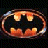 Batman logo with orange glow on dark background, green text 'Original Icons .com' on right side.