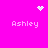 Bright pink background with four instances of the name "Ashley" in white pixelated text and three distinct white pixel art symbols positioned above and between the text.