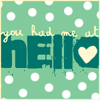 Pixelated green polka-dot background with white dots, overlaid text reading "you had me at hello" where "hello" is large dark green letters with a heart replacing the 'o'.