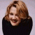 A pixelated image of a person with light brown hair wearing a black top, positioned next to green text reading 'Original Icons .com' on a dark background.