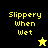 Pixelated text "Slippery When Wet" appears on split black-yellow and olive-green backgrounds with a yellow star and black star icon.