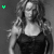 A grayscale image of a woman with long wavy hair wearing a dark sleeveless top, shown in three variations with different color overlays and cropping.