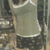 A static image with four distinct text sections over a blurred background of what appears to be stone or metal structures.