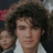 A pixelated image shows a person with dark curly hair on the left, next to green background text reading 'Stop Kevin Hate!' in bold brown letters.