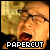 Pixelated close-up of a person with glasses and an open mouth, overlaid with bold text reading "PAPERCUT" at the bottom.