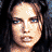 A 4-frame contact sheet of a pixelated animated icon featuring three distinct female faces and text, arranged in a 2x2 grid with black background on the right frames.