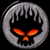 Static pixel art icon featuring a circular gray ring with dripping texture enclosing glowing orange eyes and mouth on black background.