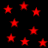Red star shapes scattered across a black background, with some stars appearing blurred or partially obscured.