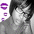 A grayscale image of a person with short dark hair and glasses, wearing a sleeveless top, positioned next to purple lip-shaped icons on the left.