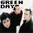 Animated contact sheet of a 48x48 pixel buddy icon featuring Green Day band members with changing heart symbols above text, displayed in a 5x5 grid layout on gray transparency background.