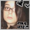 A static image shows a person with long brown hair and glasses, two black-and-white heart shapes in the top right corner, and pixelated text at the bottom.