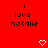Red background with black text reading 'i love natalie' and two white pixelated hearts below the text.