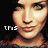 A pixelated image of a woman's face with text overlays in different positions across four