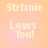 Pixelated text reads "Stefanie Loves You!" on a gradient background shifting between peach and pink hues.