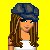 Pixel art contact sheet showing multiple views of a female character with long brown hair, white crop top, blue jeans, and dark cap against yellow background with "Baby Gurl" text.