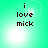 Pixelated text 'i love mick' on a green background with shifting light effects.
