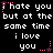 Pixelated text repeats 'I hate you but at the same time i love you' with pink star and dot accents on black background.