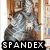 A pixelated statue figure in a library setting with text overlays changing across frames.