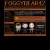 Pixelated image of a wooden bookshelf with three figures in the lower section, dark background, and visible text at the top.