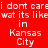 Red background with white pixelated text repeating 'i dont care i dont care wat its like in Kansas City' across multiple , some words highlighted in dark red