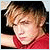 A contact sheet of three pixelated frames showing a person with light brown hair in different poses and outfits, below which is red text reading "TOTAL HOTTIE!" on a light blue background.