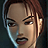 Pixelated close-up of a character's face with brown hair, visible eye details, and light skin tone on dark background.