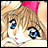 Anime-style character with brown hair and blue eyes, wearing a pink bow, next to black background with white text.