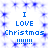 Blue pixelated text on white background reads "I LOVE Christmas !!!!!!!" in two identical vertical with blue star-like patterns surrounding the text