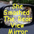 Yellow text overlays on a car's rearview mirror image, with partial phrases about smashing the mirror and never looking back.