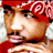 Pixelated static icon of a person wearing red headwear with white floral patterns and a red garment, cropped to show upper face and shoulders against a light background.