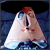 Animated pixel art of a character with a triangular face, blue eyes, and a black top hat against a blue background with text overlays.