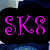 Animated icon with three distinct text displays: 'SK8', 'OR', and 'DIE!' in pink stylized font on black rounded rectangles against a blurred background.