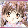 Anime-style character with brown braided hair and large brown eyes, wearing a light blue and pink outfit with sparkles around the head.