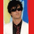 A 2x2 contact sheet of four pixelated frames featuring a person in various poses with text "I Love Billie Joe" on red background, displayed as an animated icon frame sequence.
