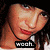 Pixelated close-up of a person with light skin tone, red lips, and dark hair wearing a black choker necklace against a solid black background.
