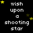 Black background with white pixelated text reading "wish upon a shooting star" repeated in , yellow and brown stars scattered around