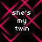 Pixelated text 'she's my twin' repeated four times on a black background with pink diamond-shaped lines forming a pattern