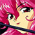 Pixelated close-up of a character with bright pink hair, large dark eyes, and a light skin tone, wearing a dark blue collar against a pink background.