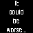 A static image shows a character with green skin, large eyes, and a big nose against a blue background with purple flowers. Text above the character repeats 'It could be worse... You could be bald and have a big nose.' in white and cyan pixelated font.