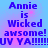 Blue and pink pixelated text on a gradient background reads "Annie is Wicked awsome! UV YA!!!!!!" in a repeated pattern.