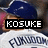 A pixelated image of a person wearing a blue cap and white shirt with dark text, featuring overlaid black bars containing white text.