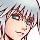 Pixelated close-up of a person's face with light skin, brown hair, and green eyes against a gradient background.