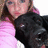 A pixelated image of a person in pink clothing holding a black dog, with green text on a black background expressing grief over 'jack' and 'jackson'.
