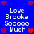Blue background with white pixelated text reading "I Love Brooke Sooooo Much" repeated in two , surrounded by red and purple heart icons