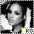 Black-and-white pixelated portrait of a woman with dark hair, wearing a white garment, with 'AKO' text in yellow and black at the bottom right.